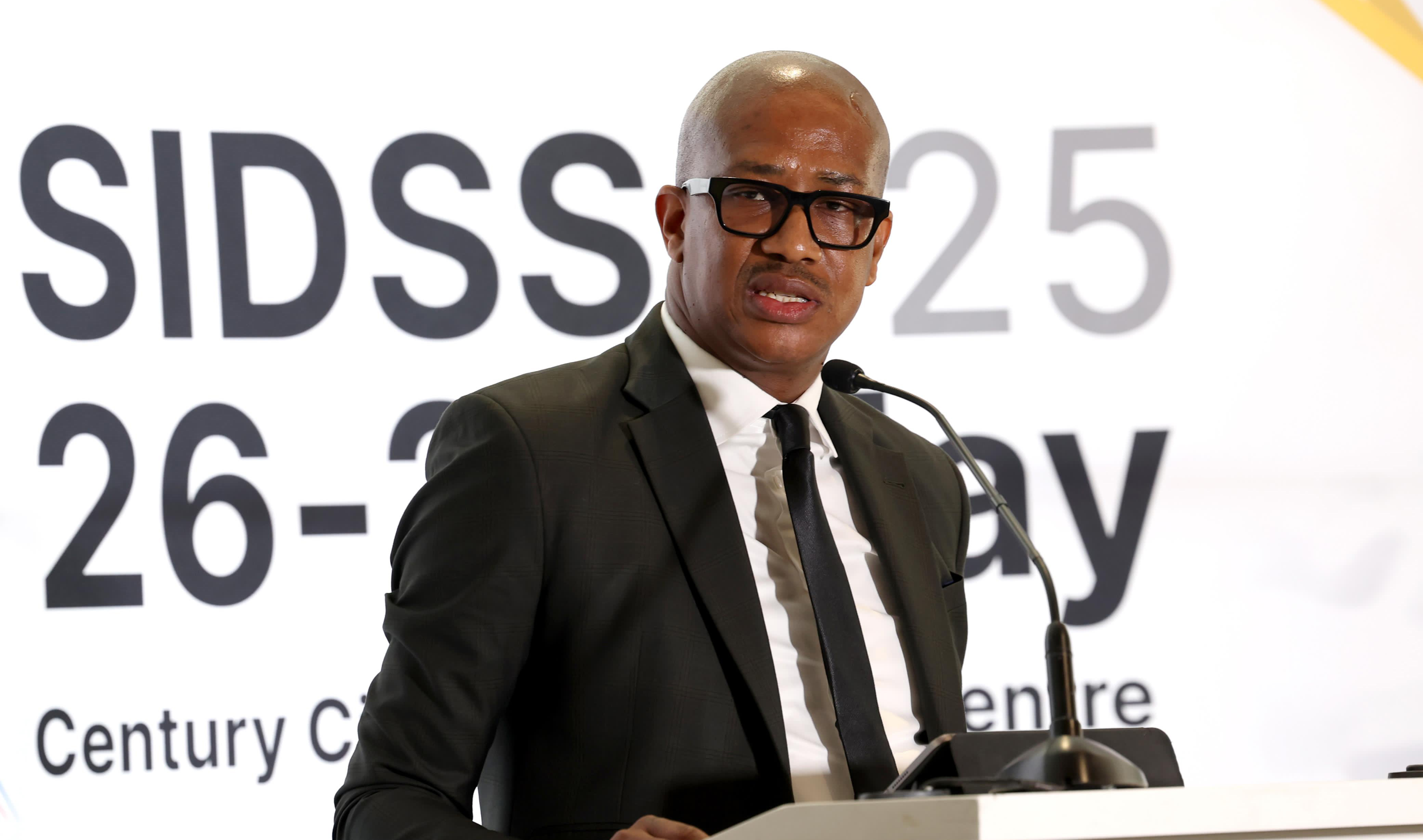 Deputy Minister Kenny Morolong moderates the media briefing ahead of SIDSSA 2025